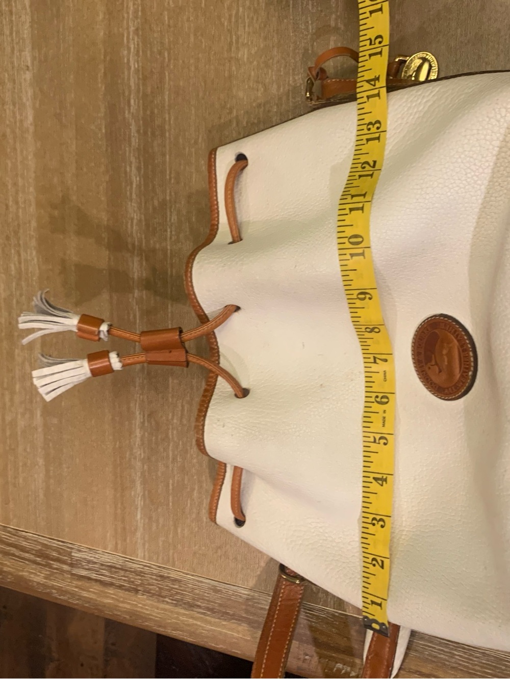 Vintage Dooney & Burke White and Brown Drawstring Bucket Bag with Tassel Accent - Picture 4 of 15